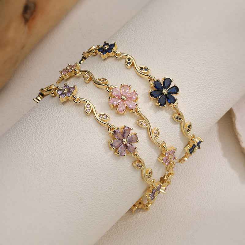 “Blossom Vine” Gold-Tone Brass Multicolor Zircon Flower Bracelet - Image 2