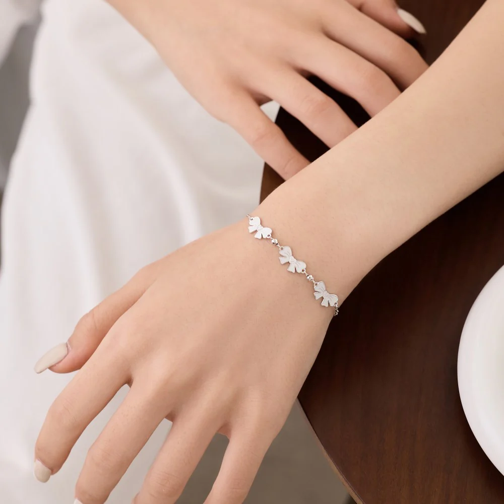 “Bowline Charm” 925 Sterling Silver Bow Bracelet with Adjustable Chain - Image 2