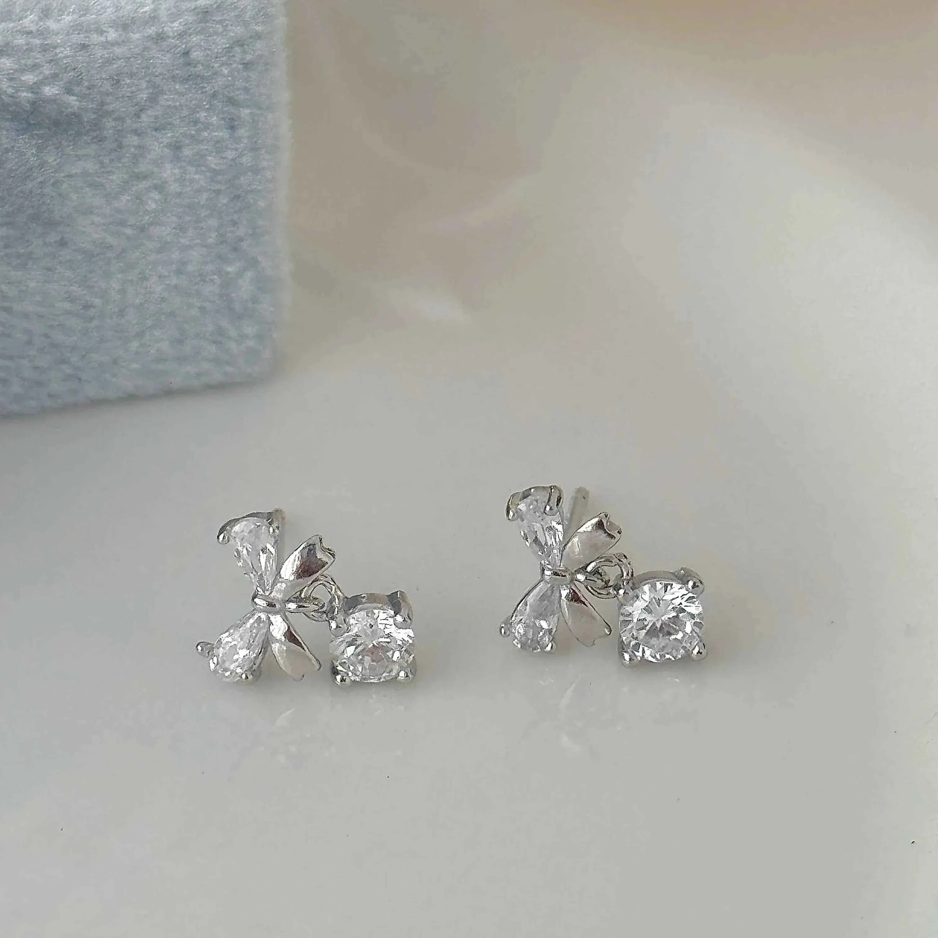 "Hepburn Bow" 999 Pure Silver Bow Stud Earrings - Chic and Versatile - Image 4