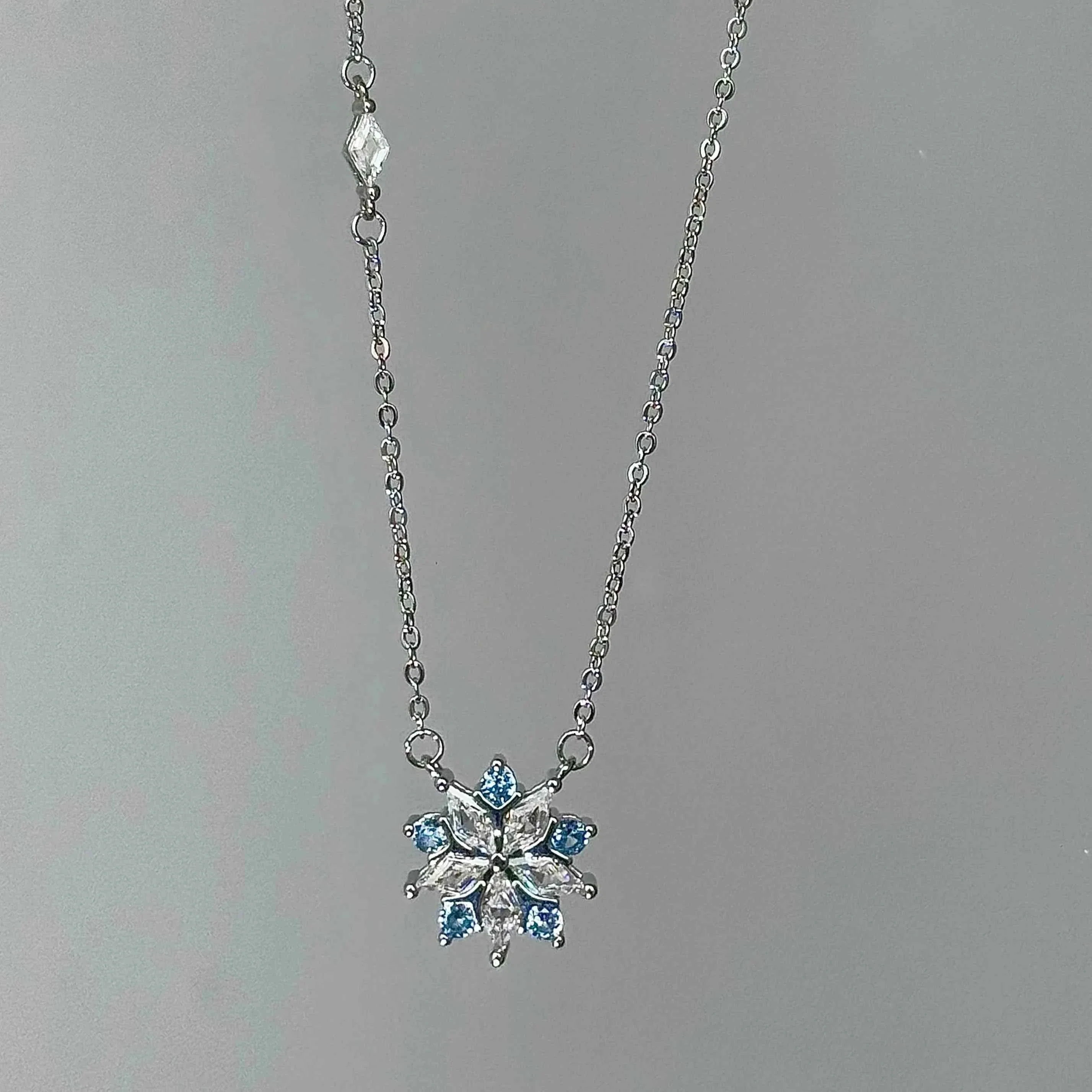 "Ice Blossom" Ice Blue Snowflake Necklace – Unique Design for Your Bestie - Image 3