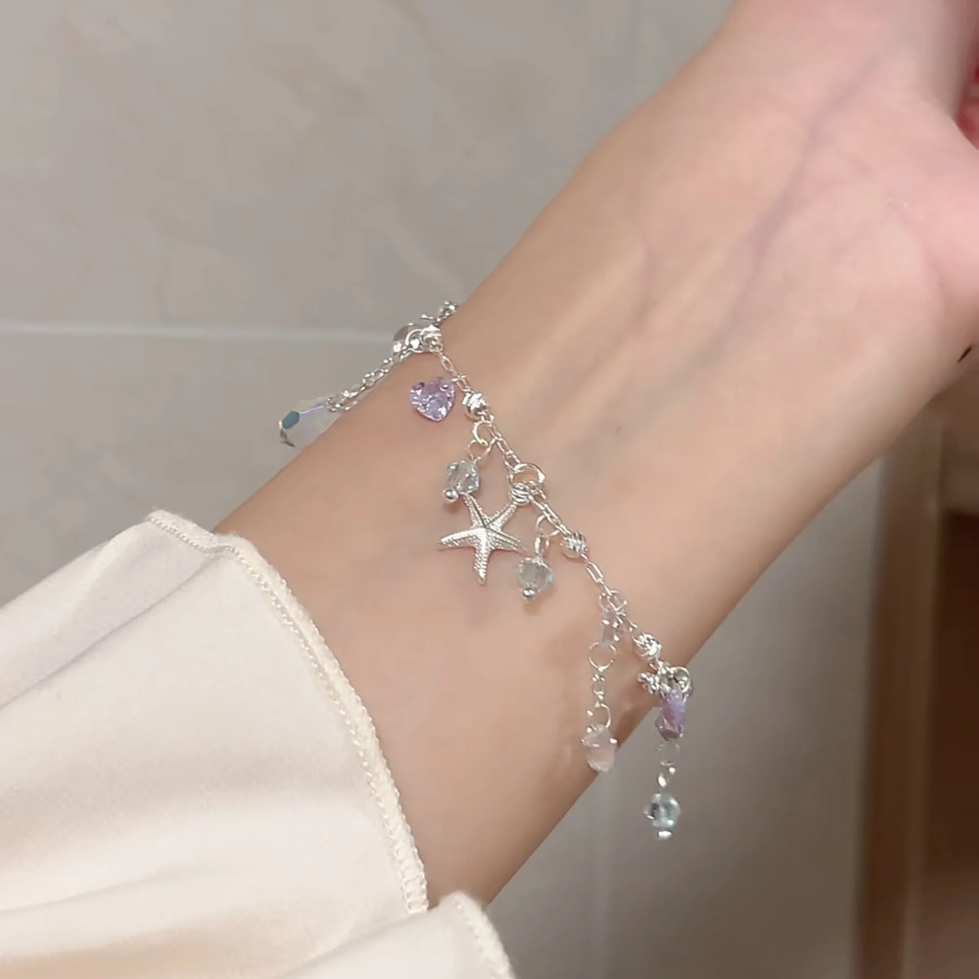 “Island Drizzle” Silver-Plated Starfish Tassel Jewelry Set (Necklace & Bracelet) - Image 6