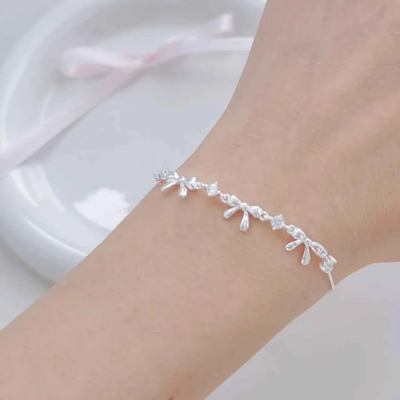 "Korean Bow" 925 Sterling Silver Bow Bracelet with Zircon – Sweet & Shimmering - Image 2