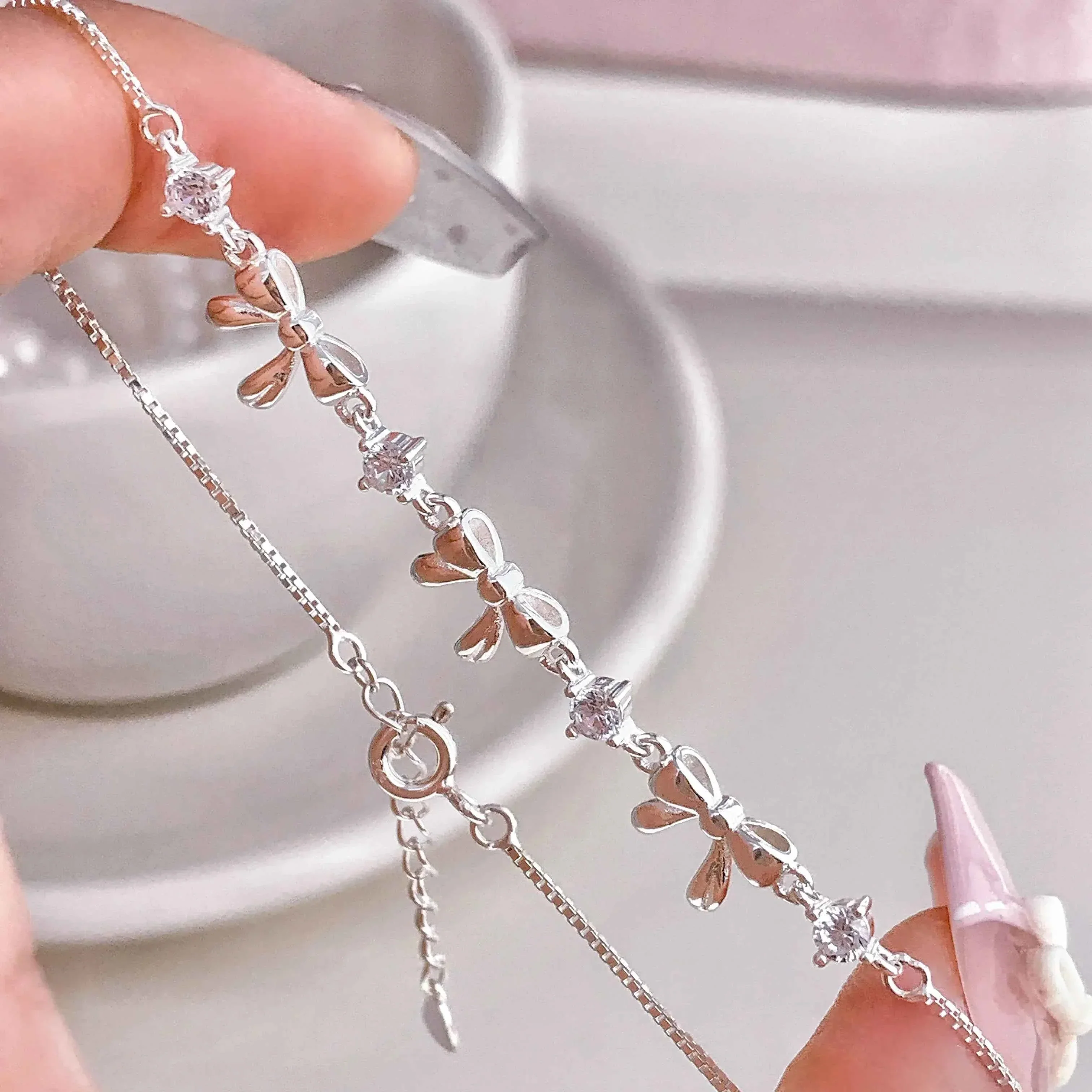 "Korean Bow" 925 Sterling Silver Bow Bracelet with Zircon – Sweet & Shimmering - Image 4