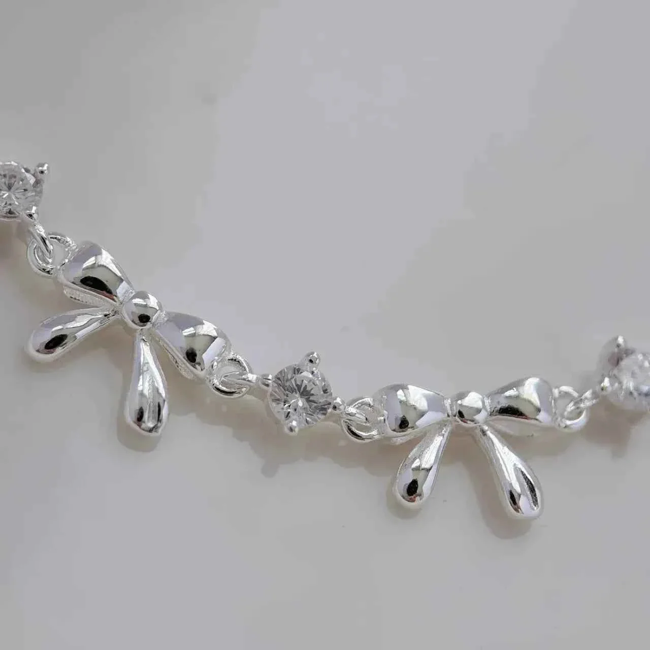 "Korean Bow" 925 Sterling Silver Bow Bracelet with Zircon – Sweet & Shimmering - Image 6