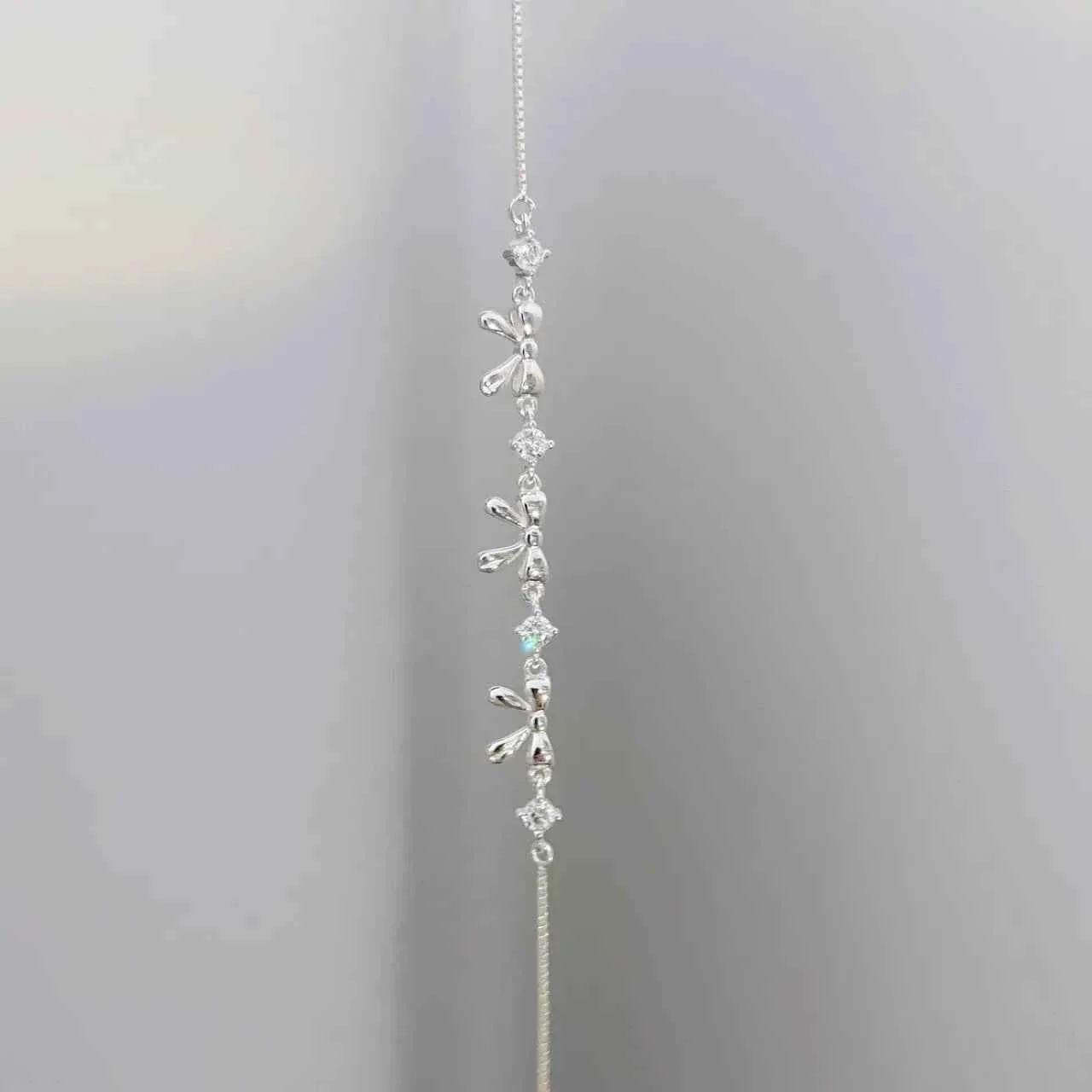 "Korean Bow" 925 Sterling Silver Bow Bracelet with Zircon – Sweet & Shimmering - Image 9