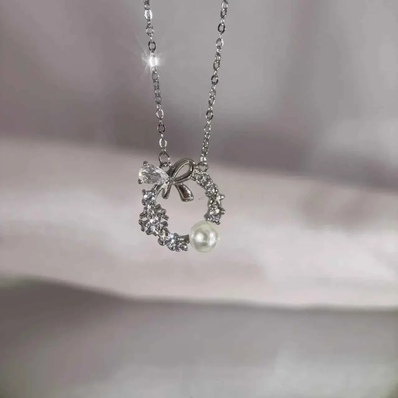 "Lucky Garland" 925 Sterling Silver Bow and Snowflake Necklace - Elegant and Unique - Image 4
