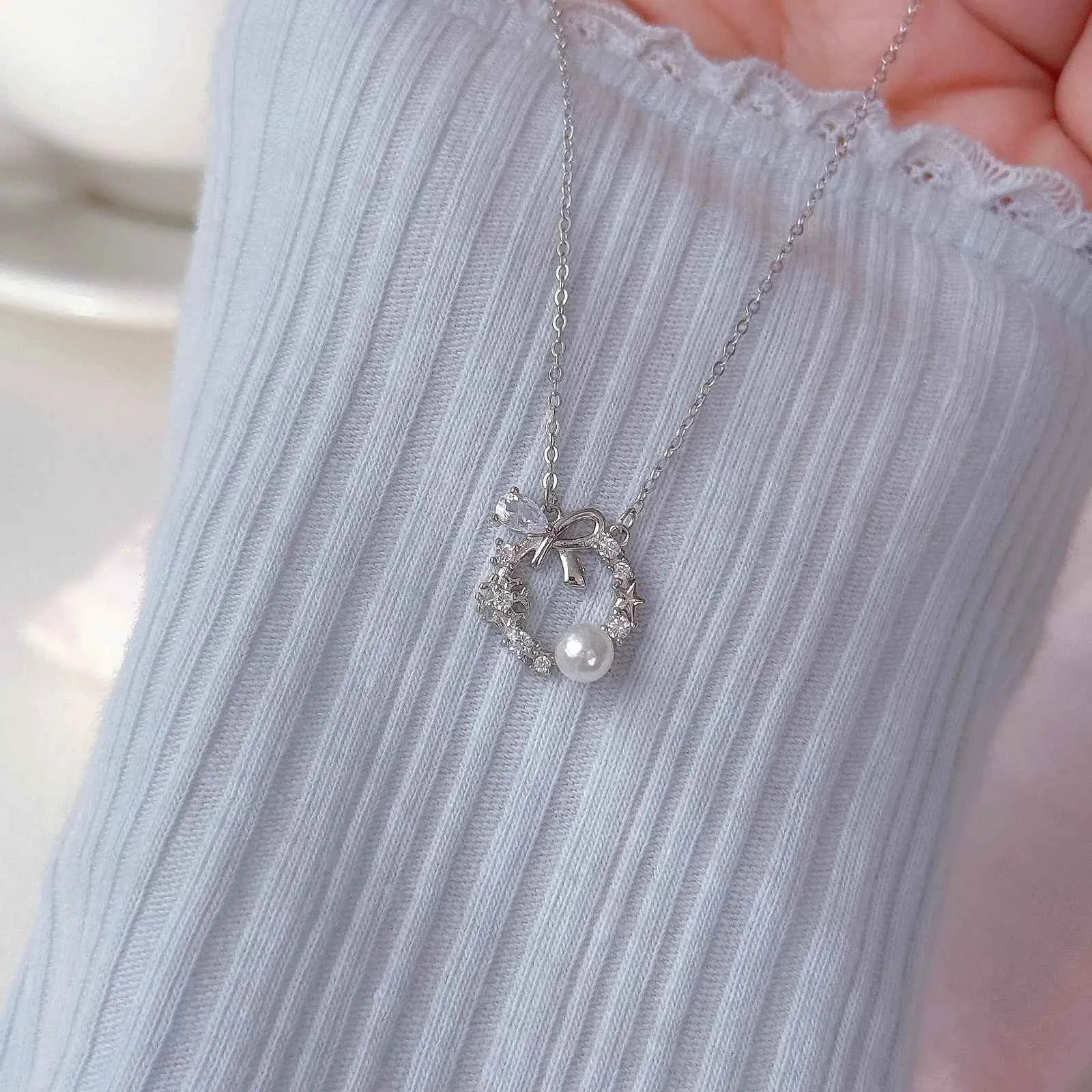 "Lucky Garland" 925 Sterling Silver Bow and Snowflake Necklace - Elegant and Unique - Image 5