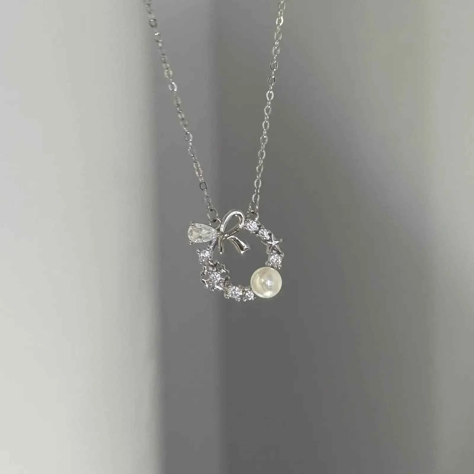 "Lucky Garland" 925 Sterling Silver Bow and Snowflake Necklace - Elegant and Unique - Image 7