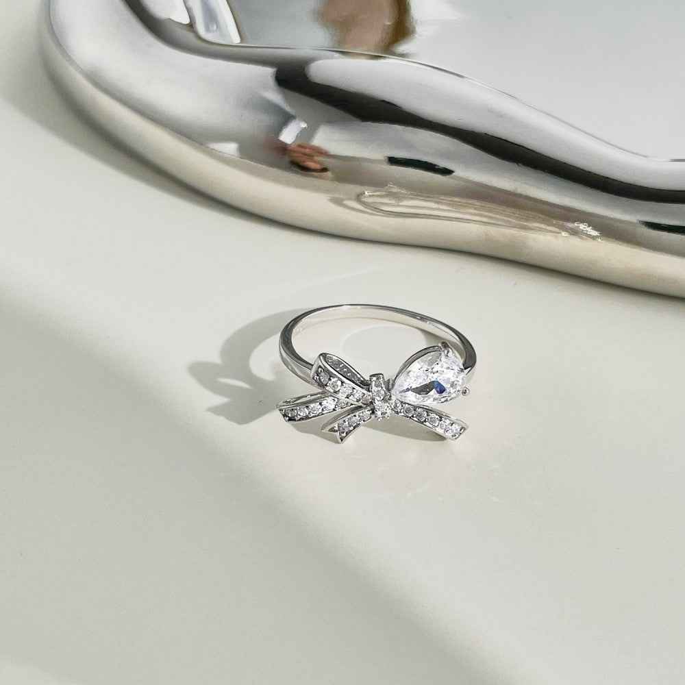 “Lumière Bow” 925 Sterling Silver Pear-Cut Bow Ring - Image 3